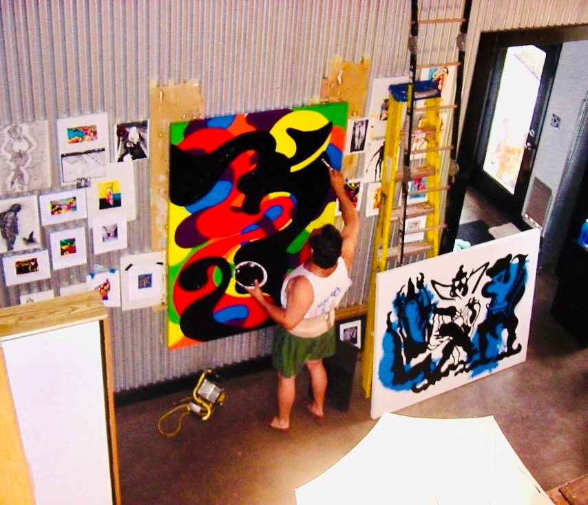 V. Les Rogers painting in studio