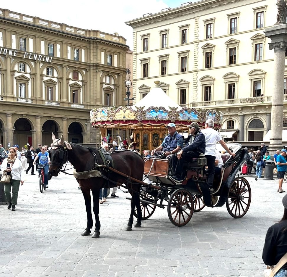 Horse-drawn carriage historic Italian piazza Florence