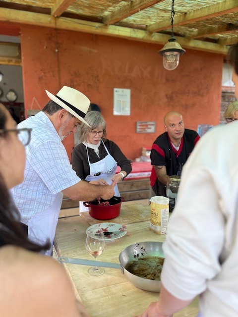 Group cooking class rustic kitchen San Gimignano