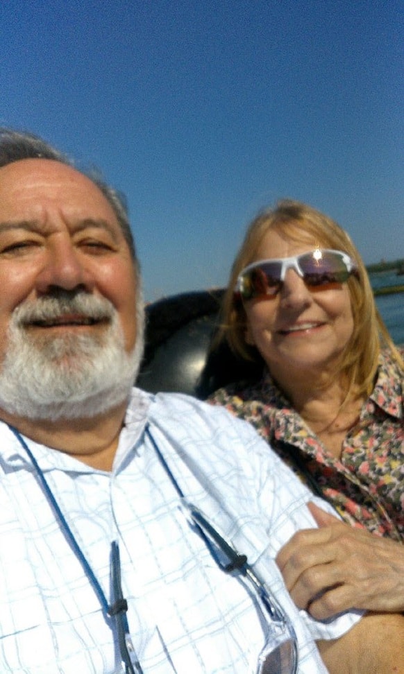 Couple on gondola sunny Venice day