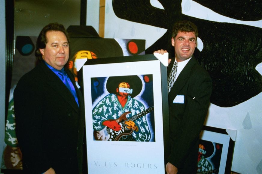 V. Les Rogers with signed SRV print